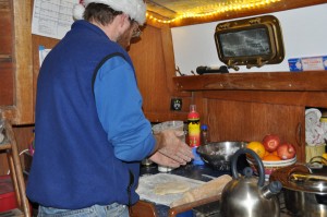 Barry rolling out the noodles. This shows just how tiny our galley is -- Barry's working on top of the icebox, next to the stove.